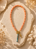 Coral Bead Necklace with Dual Fish Charms