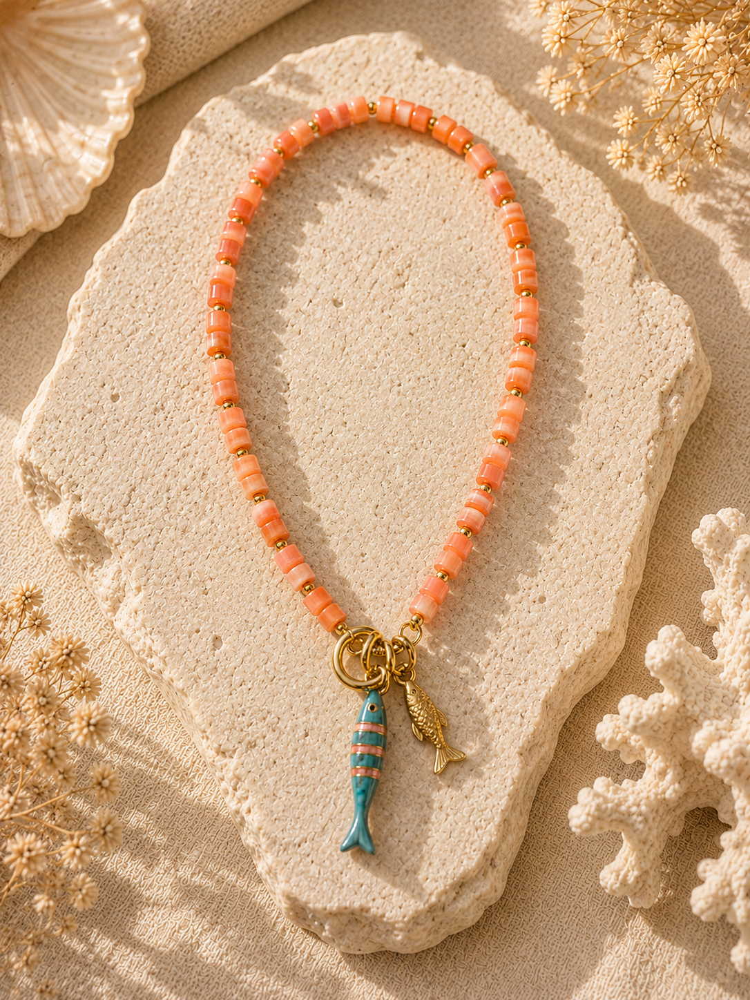 Coral Bead Necklace with Dual Fish Charms
